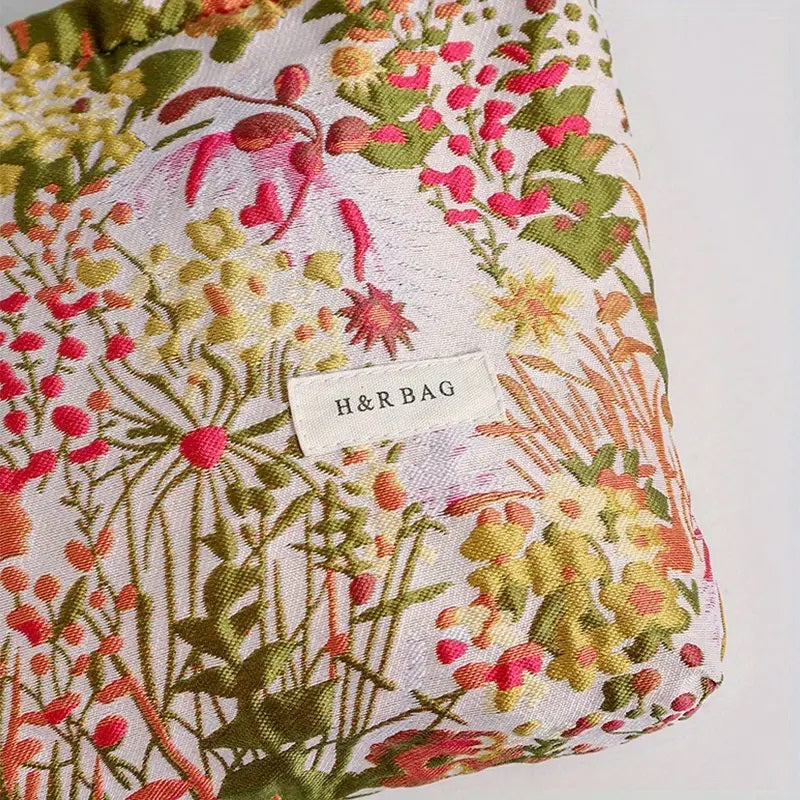 Blomsterbrodert kosmetikkveske