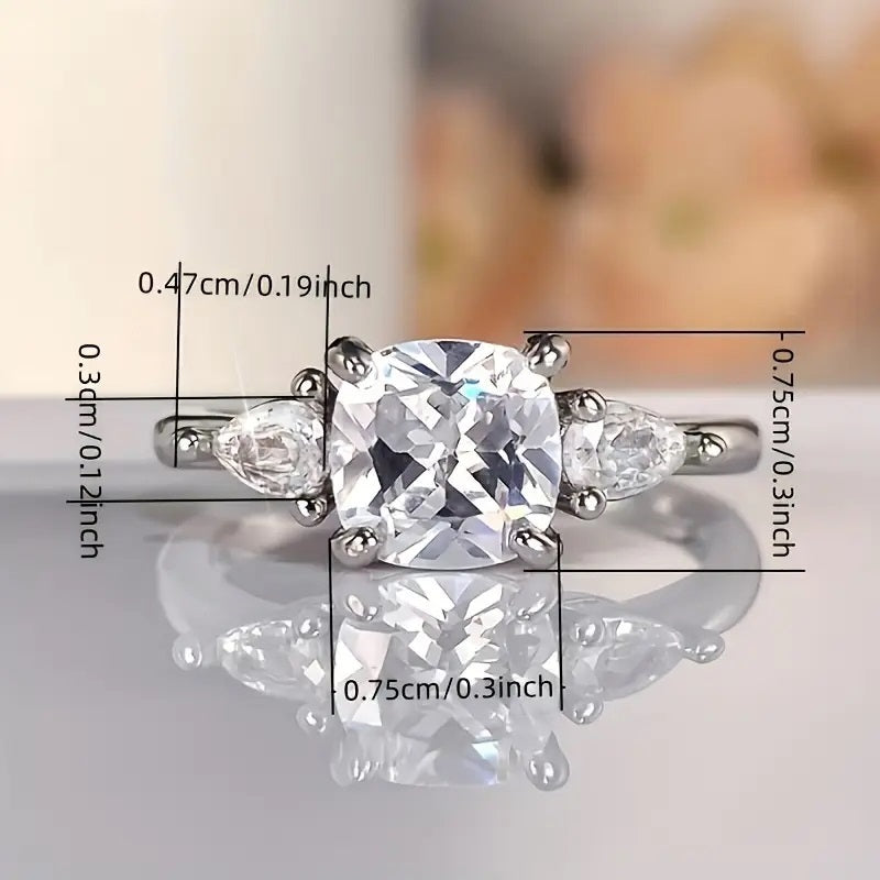 Elegant Ring With a 4-Prong Setting with Synthetic Zirconia.