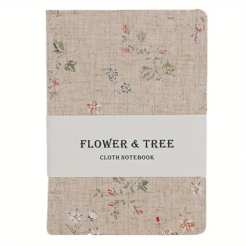 Notatbok med Blomster- og Tremønster på Lintrekk