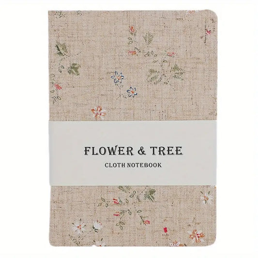 Notatbok med Blomster- og Tremønster på Lintrekk